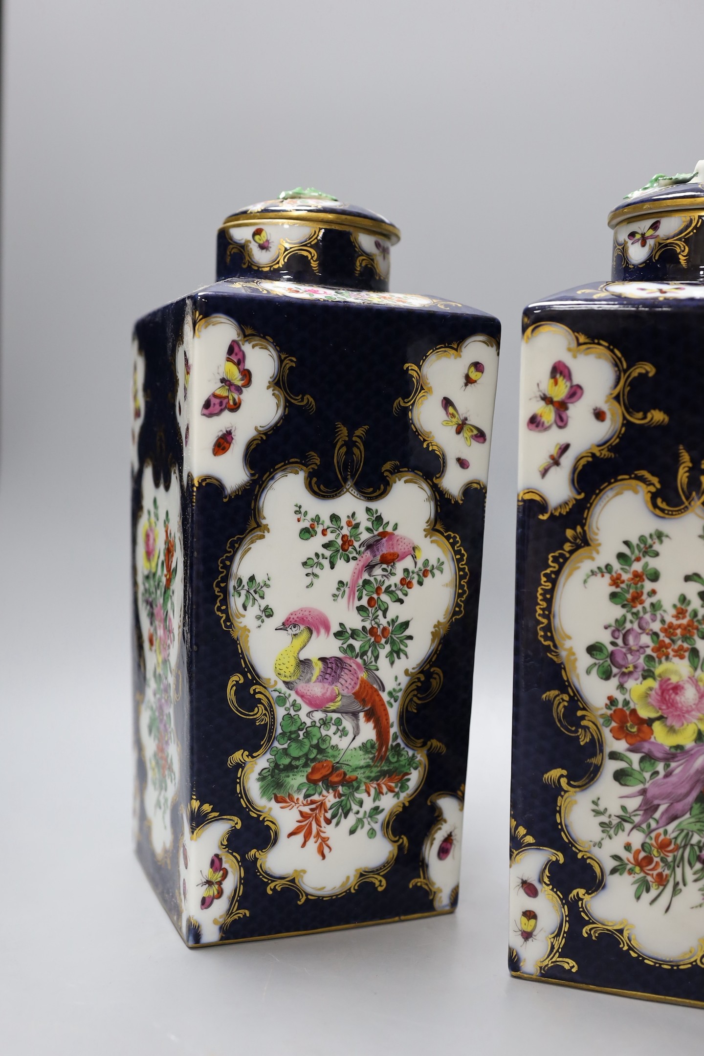 A pair of large Samson tea canisters in Worcester style and a 19th century cut glass bowl and cover, canisters 27 cms high